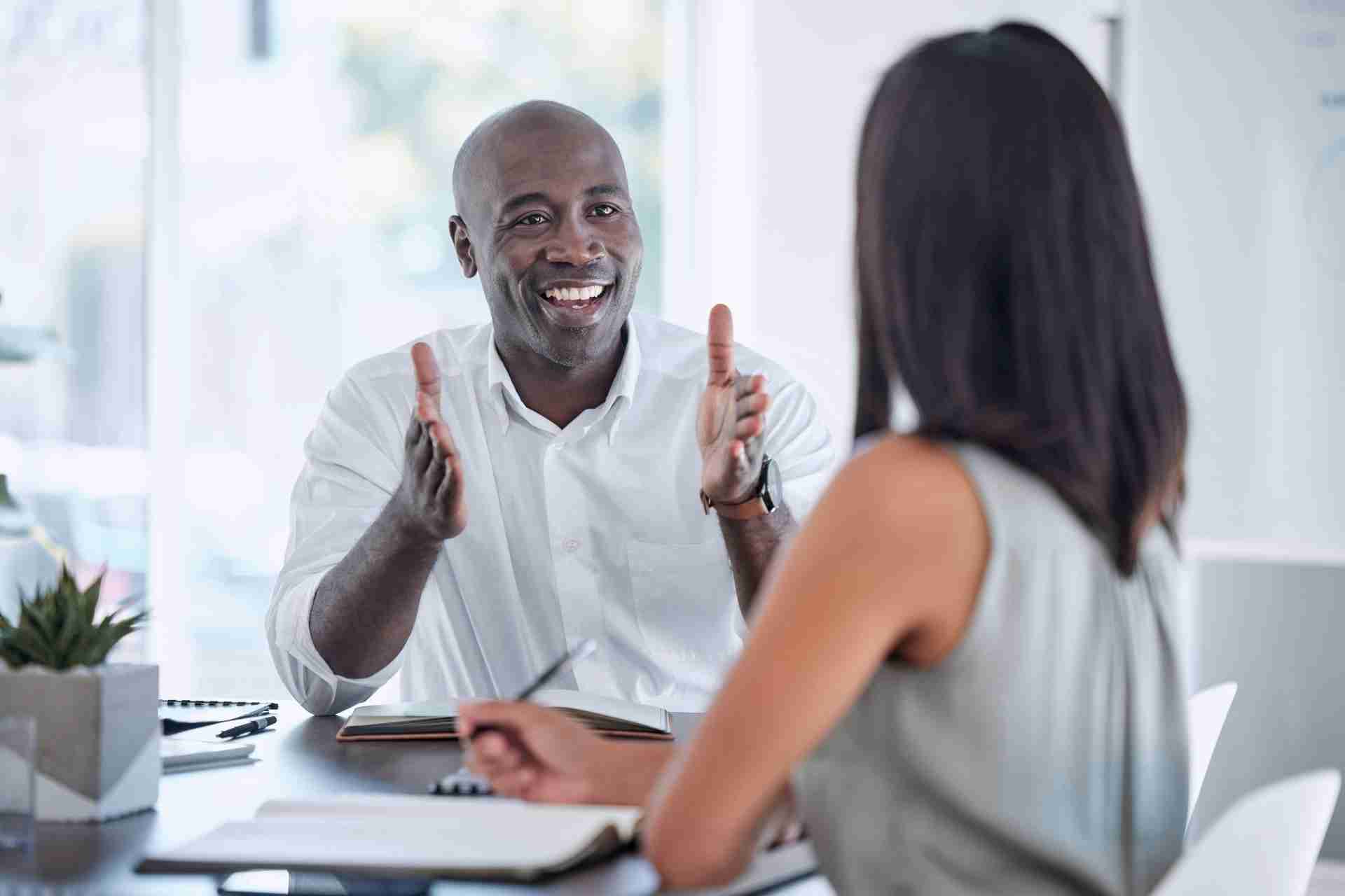 Mental health professional discussing treatment options with a client during an assessment